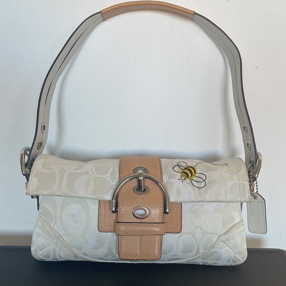 Coach handbag. White and tan leather.